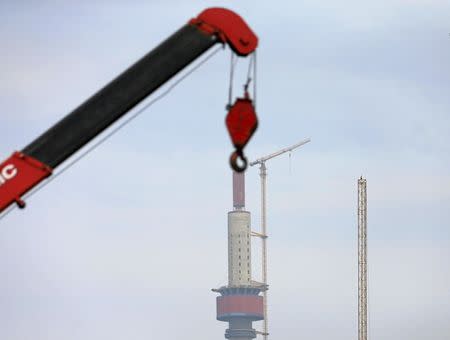 The Lotus Tower construction site, backed by Chinese investment, is seen in Colombo February 8, 2016. REUTERS/Dinuka Liyanawatte