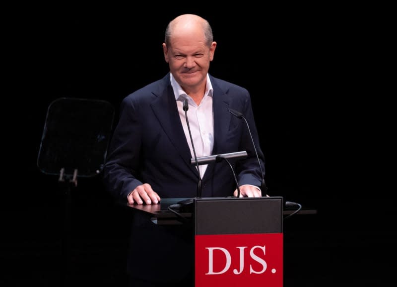 German Chancellor Olaf Scholz gives a keynote speech during the celebration of the 75th anniversary of the German School of Journalism (DJS) at the Prinzregenten Theater.  Sven Hoppe/dpa