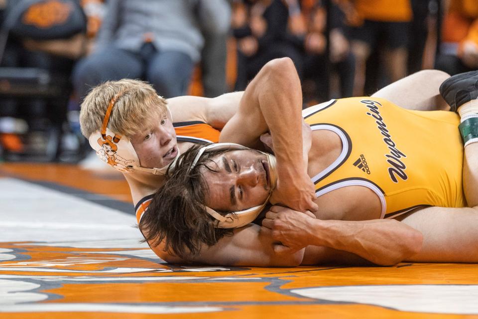 Oklahoma State redshirt freshman Victor Voinovich, left, is of to a 3-0 start in his first season in the OSU lineup.