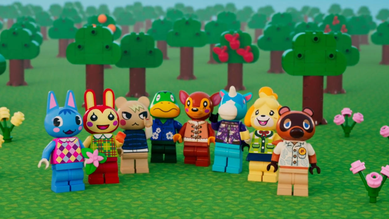  Lego Animal Crossing characters stand in front of a Lego forest. 