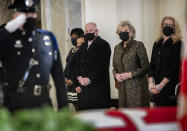 Gov. Larry Hogan, center, with wife Yumi, left, stands with family members of the late Senate President Emeritus Thomas V. Mike Miller, Jr., under the dome of the statehouse at the Maryland Statehouse in Annapolis, Md., on Friday, Jan. 22, 2021. Miller was a state legislator for 50 years. A Democrat, he served as president of the Maryland Senate for 33 years. He announced he was stepping down from the post in 2019, but he remained a senator until December. (Bill O'Leary/The Washington Post via AP, Pool)