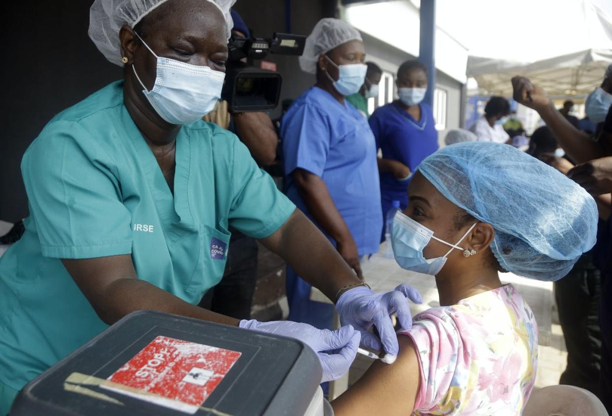 <span class="caption">Hospital staff in Lagos, Nigeria, administer the AstraZeneca vaccine.</span> <span class="attribution"><a class="link " href="https://newsroom.ap.org/detail/VirusOutbreakNigeriaAfricaVaccines/f37e2b62ec484fc1970d3dbcbb49c3b3/photo" rel="nofollow noopener" target="_blank" data-ylk="slk:AP Photo/Sunday Alamba;elm:context_link;itc:0;sec:content-canvas">AP Photo/Sunday Alamba</a></span>