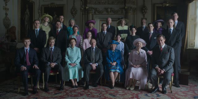 <p>Netflix</p> Netflix depicts the royal family taking a group photo in season 6, part 2 of The Crown.