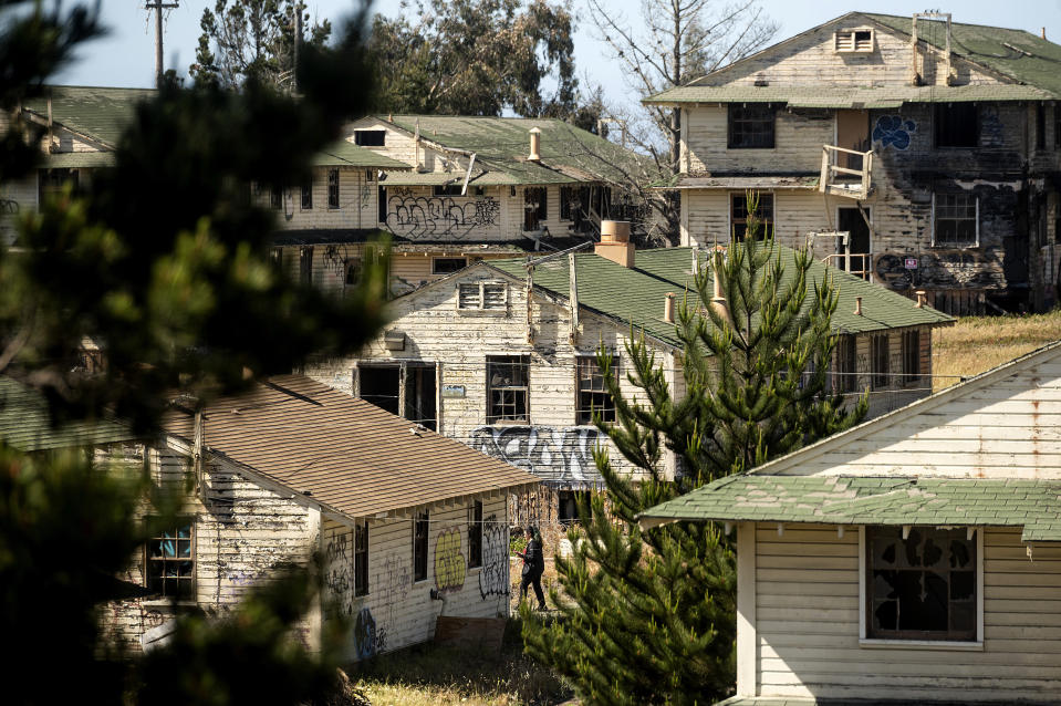 Former barracks line a hill at Fort Ord on Thursday, April 29, 2021, in Fort Ord, Calif. Many veterans of Fort Ord who believe their cancers were caused by exposure to chemicals at the base have been denied disability and medical benefits from the Department of Veterans Affairs. (AP Photo/Noah Berger)