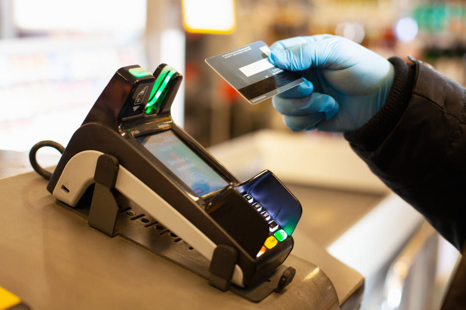 The increasing decline of high street bank branches and ATMs has made the possibility of a cashless society in the next few years 'more likely than ever before,' a new report said. Photo: Getty