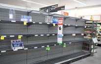 Empty supermarket shelves in Townsville as residents prepared for Cyclone Debbie on Sunday. Photo: Getty Images