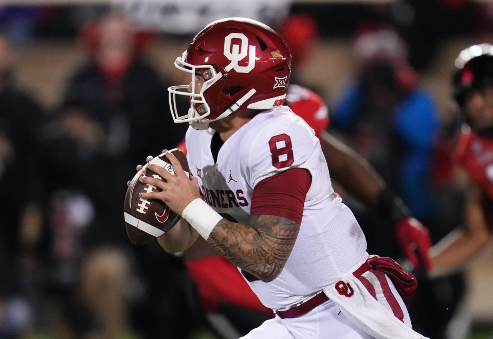 Dillon Gabriel #8 of the Oklahoma Sooners looks to pass during the first quarter against the Texas Tech Red Raiders at Jones AT&T Stadium on Nov. 26, 2022 in Lubbock, Texas. Josh Hedges/Getty Images