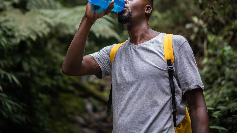 You should carry plenty of water when hiking no matter the season, but especially during hot weather. - FG Trade/E+/Getty Images