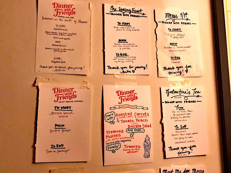 old dinner with friends menus hanging on anita's wall