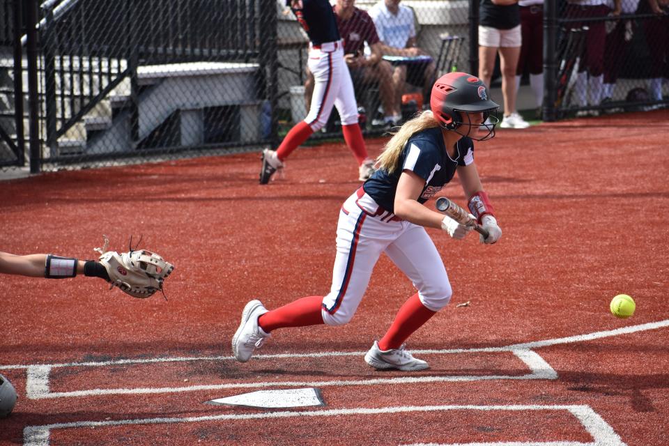 Taylor Raux lays down a bunt for New Hartford in the 9-3 loss to Troy on Saturday, June 4, 2022 at Carrier Park