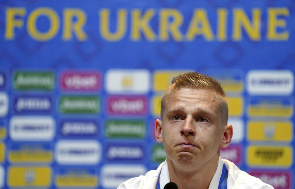 Ukraine's Oleksandr Zinchenko reacts, during a press conference, at Hampden Park, in Glasgow, Scotland, Tuesday May 31, 2022. Scotland will play Ukraine in a World Cup qualifier soccer match on Wednesday. (Andrew Milligan/PA via AP)