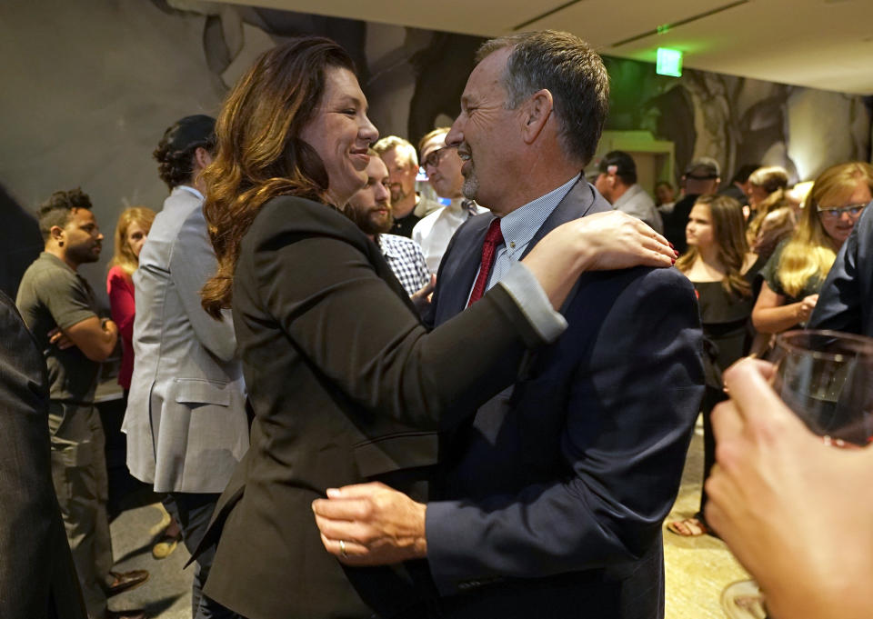 FILE - Republican gubernatorial candidate, state Sen. Brian Dahle, right, hugs his wife Assemblywoman Megan Dahle, in celebration at an election night gathering in Sacramento, Calif., June 7, 2022. Sen. Dahle finished second in California's primary on June 7, and knows it will be hard to defeat incumbent Democratic Gov. Gavin Newsom. He plans to focus on what he says are the problems people care about the most, including high gas prices and rising crime. (AP Photo/Rich Pedroncelli, File)