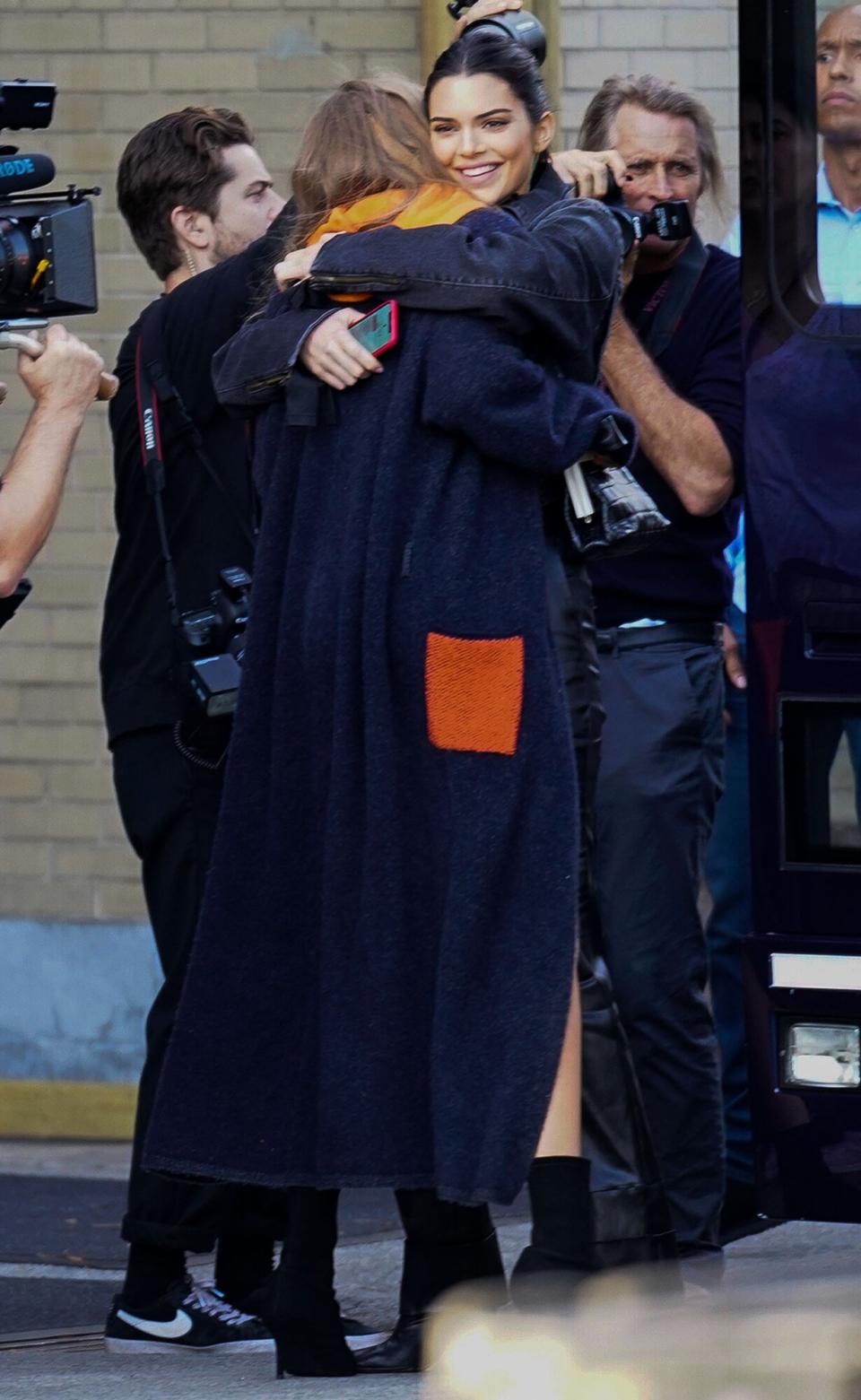 Gigi Hadid and Kendall Jenner hug each other when arriving for Victoria's Secret fashion show rehearsals on November 7, 2018 in New York City