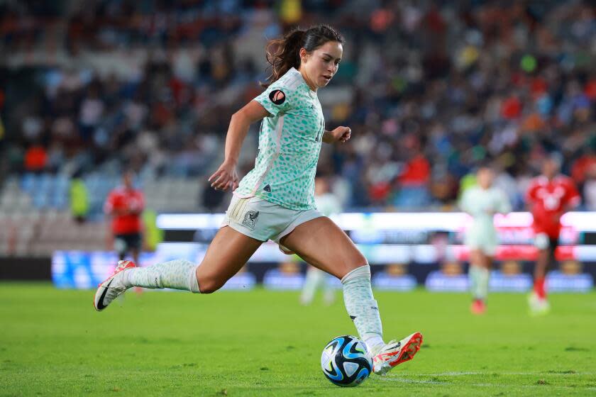 PACHUCA, MEXICO - SEPTEMBER 26: Scarlett Camberos of Mexico runs with the ball during the Concacaf W Gold Cup Qualifier match between Mexico and Trinidad & Tobago at Hidalgo Stadium on September 26, 2023 in Pachuca, Mexico. (Photo by Hector Vivas/Getty Images)