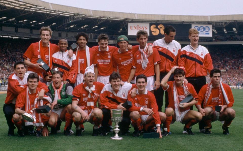 Nottingham Forest celebrate with the trophy after their 3-1 victory over Luton Town in the Littlewoods League Cup Final at Wembley Stadium in London, 9th April 1989 - Professional Sport/Popperfoto via Getty Images/Getty Images