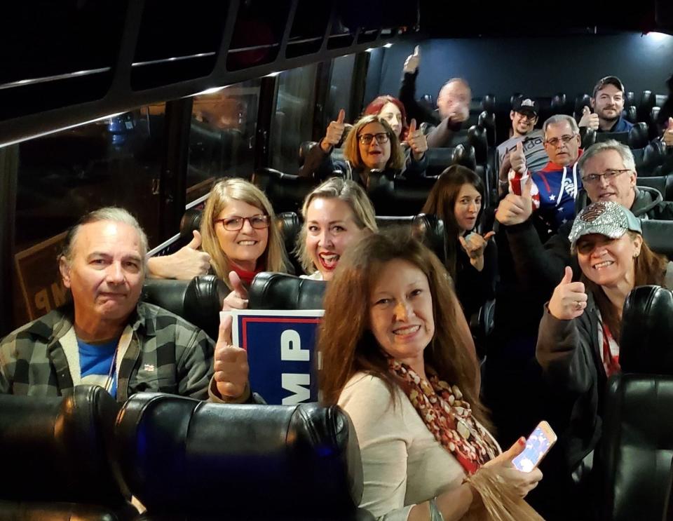 Trump supporters before leaving Fort Walton Beach City Hall in Florida to travel to Washington in January 2021.