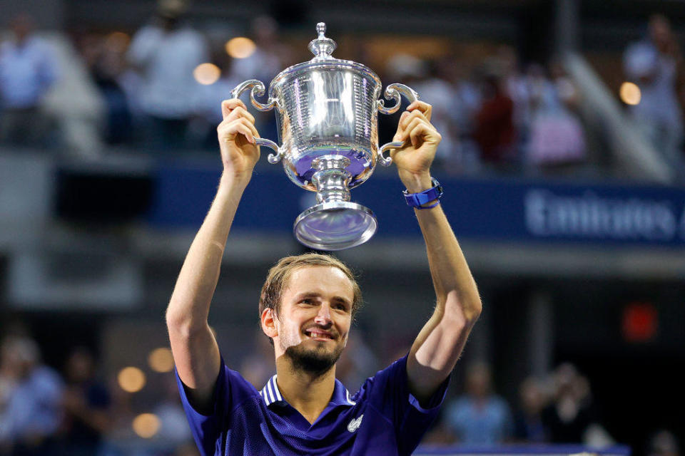 Daniil Medvedev of Russia celebrates with the championship trophy after defeating Novak Djokovic of Serbia to win the Men's Singles final match of the 2021 U.S. Open on Sunday, September 12, 2021. / Credit: Getty Images