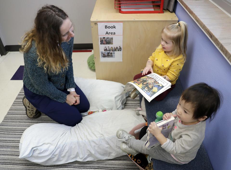 Wisconsin Department of Children and Families Secretary Emilie Amundson visits with Kynlee Giese, center, and Norah Zhang, right, during a visit at Bridges Child Enrichment Center on Thursday, February 16, 2023 in Appleton, Wis. Bridges is one of thousands of child care programs that receive Child Care Counts help. Wm. Glasheen USA TODAY NETWORK-Wisconsin
(Photo: Wm. Glasheen/USA TODAY NETWORK-Wisconsin, Wm. Glasheen)