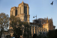 Notre-Dame cathedral is seen at sunset after repair work stops due to the coronavirus (COVID 19) outbreak one year after fire ravaged the emblematic monument as the coronavirus lockdown continues on April 14, 2020 in Paris, France. April 15 marks the first anniversary of the fire at Notre Dame destroying many parts of the Gothic cathedral. The coronavirus pandemic has spread to many countries across the world, claiming over 125,000 lives and infecting over 1.9 million people. (Photo by Chesnot/Getty Images)