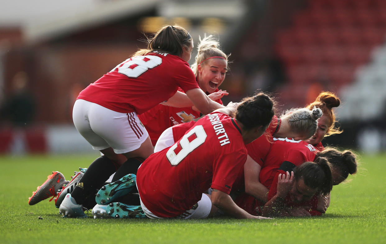 Soccer Football - FA Women's League Cup - Manchester United v Manchester City - Leigh Sports Village, Manchester, Britain - October 20, 2019  Manchester United's Katie Zelem celebrates scoring their first goal with team mates      Action Images via Reuters/Molly Darlington