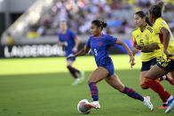 United States forward Alyssa Thompson (9) outpaces Colombia midfielder Lorena Bedoya (5) and defender Jorelyn Carabalí, right, in control of the ball during the second half of an international friendly soccer match Sunday, Oct. 29, 2023, in San Diego. (AP Photo/Alex Gallardo)