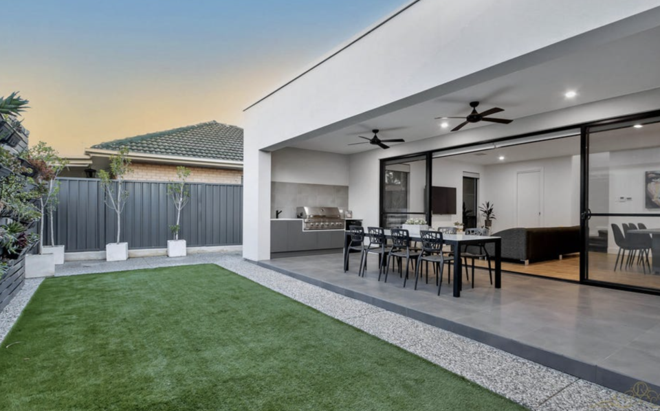 Backyard with alfresco dining at home located in 13 Warren Avenue