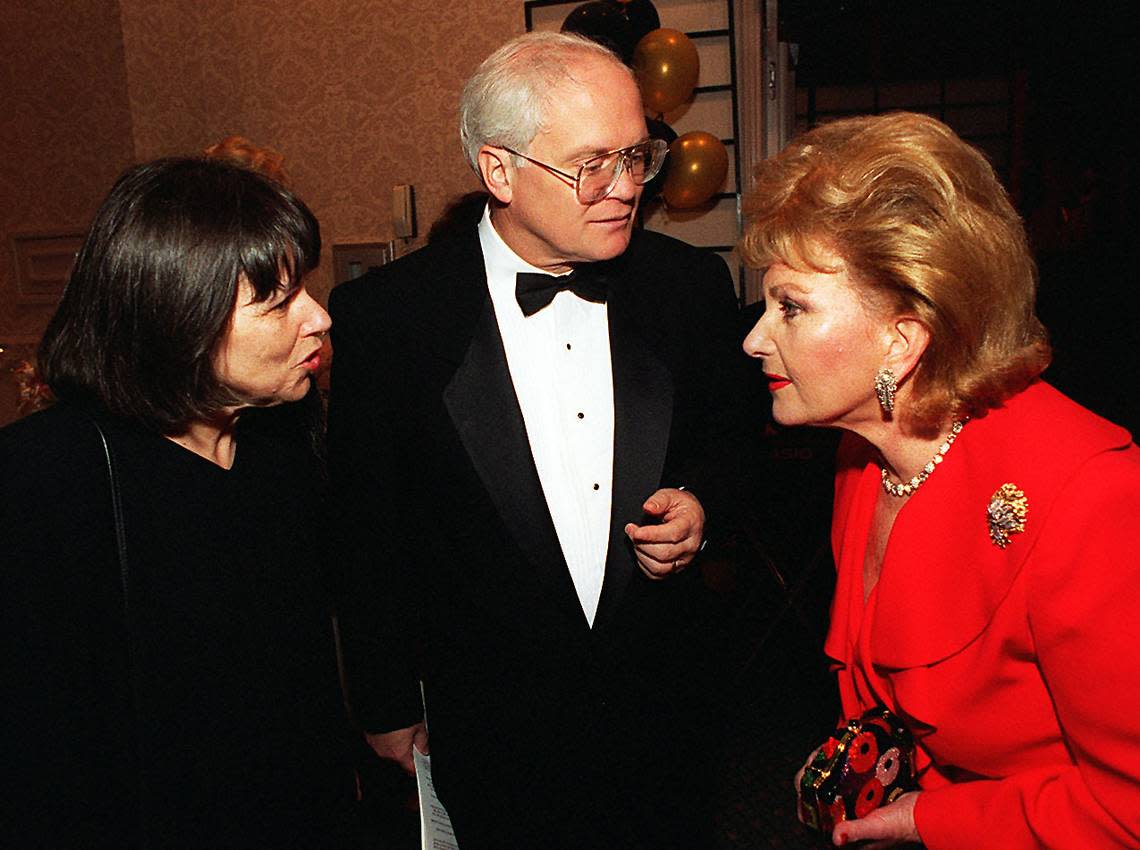 In this file photo from April 13, 1996, Roberta “Bobbie” Lawrence and former Miami Herald publisher David Lawrence, Jr., speak with Fanny Dascal at the Epilepsy Foundation Gala and Auction at the Sheraton Bal Harbour. Lawrence was being honored. Five years earlier, the Lawrences dined aboard Queen Elizabeth’s yacht, Britannia, when Queen Elizabeth and Prince Philip visited Miami in May 1991.