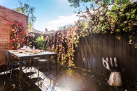 Enjoy your nibbles and wine in the sunny courtyard.