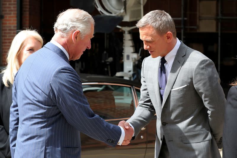 FILE PHOTO: Prince Charles visits the set of James Bond at Pinewood Studios