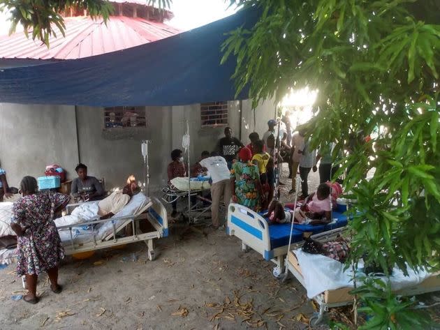 JEREMIE, HAITI - AUGUST 14: Injured people are treated in a field hospital after a 7.2 magnitude earthquake struck the country on August 14, 2021, in Jeremie, Haiti. The earthquake's epicenter was 12 kilometers (7.5 miles) northeast of Saint-Louis-du-Sud, with a depth of 10 kilometers (6 miles). (Photo by Stringer/Anadolu Agency via Getty Images) (Photo: Anadolu Agency via Getty Images)