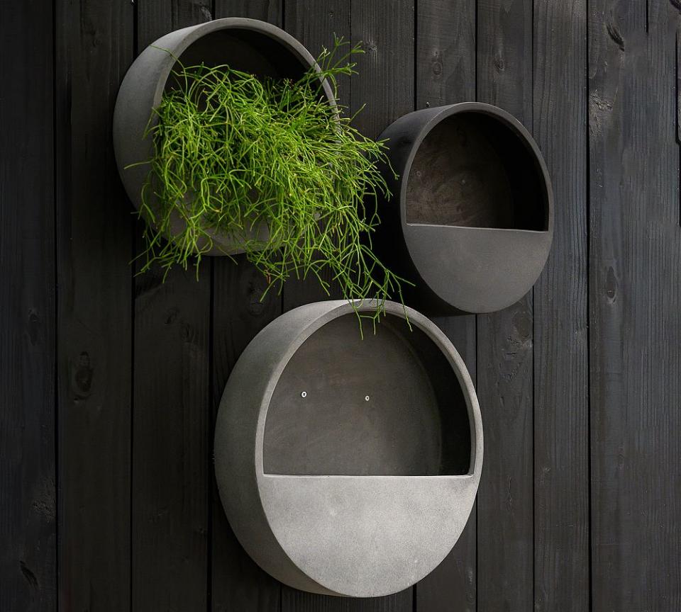 <p><a href="https://go.redirectingat.com?id=74968X1596630&url=https%3A%2F%2Fwww.potterybarn.com%2Fproducts%2Flightweight-fiber-stone-cylinder-wall-hanging-planter-mp%2F&sref=https%3A%2F%2Fwww.veranda.com%2Fshopping%2Fgarden-products%2Fg60641255%2Fbest-indoor-hanging-planters%2F" rel="nofollow noopener" target="_blank" data-ylk="slk:Shop Now;elm:context_link;itc:0;sec:content-canvas" class="link ">Shop Now</a></p><p>Lightweight Handcrafted Fiber Stone Wall Hanging Planter</p><p>potterybarn.com</p><p>$99.00</p><span class="copyright">Pottery Barn</span>