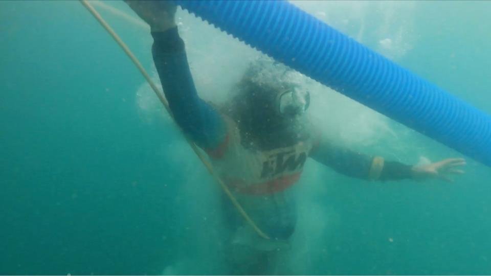 Joko underwater with his breathing tube
