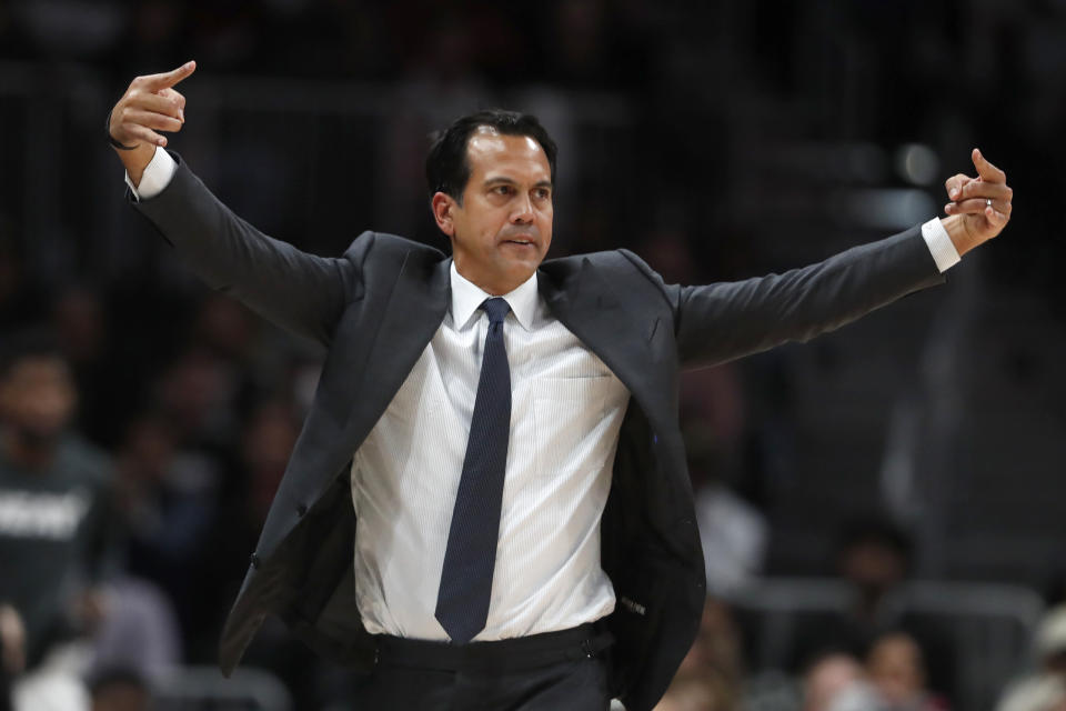 Miami Heat coach Erik Spoelstra directs players on the court during the second half of the team's NBA basketball game against the Atlanta Hawks on Thursday, Oct. 31, 2019, in Atlanta. Miami won 106-97. (AP Photo/John Bazemore)
