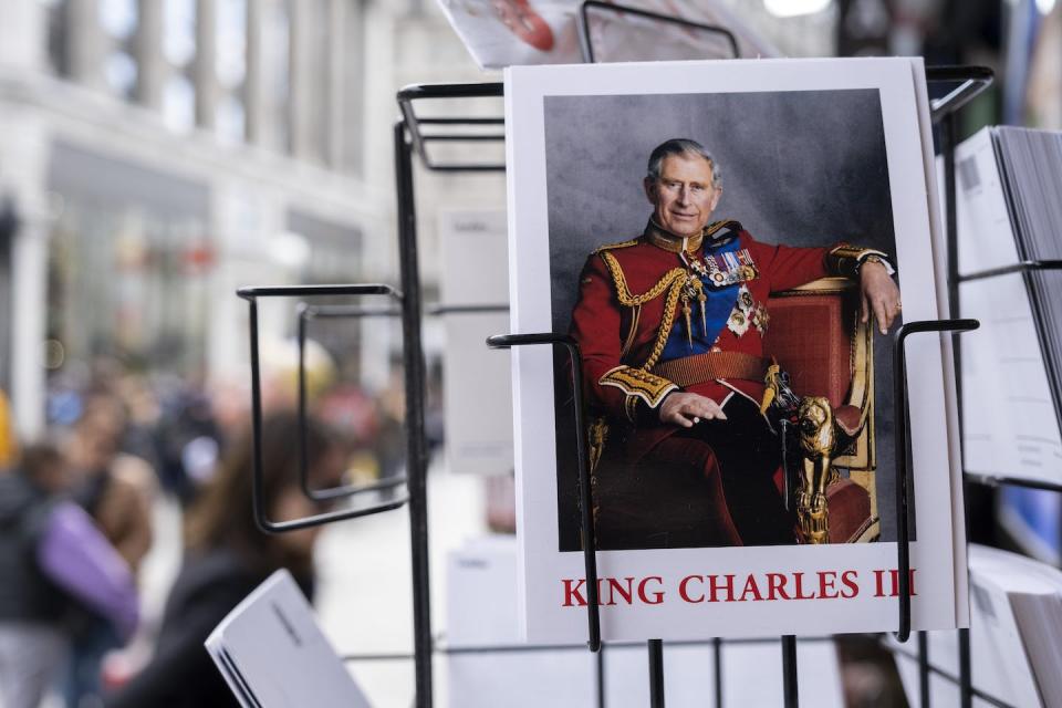 A souvenir of the big occasion. <a href="https://www.gettyimages.com/detail/news-photo/king-charles-iii-coronation-postcards-on-sale-in-a-souvenir-news-photo/1252040968?adppopup=true" rel="nofollow noopener" target="_blank" data-ylk="slk:Mike Kemp/In Pictures via Getty Images;elm:context_link;itc:0;sec:content-canvas" class="link ">Mike Kemp/In Pictures via Getty Images</a>