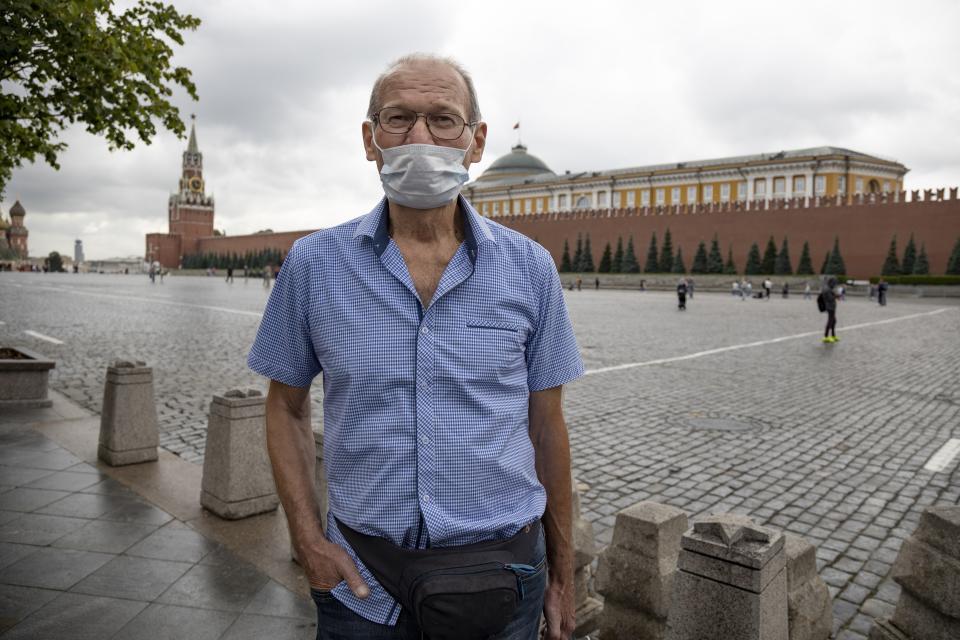 Vladimir Ignatyev, 73, speaks while at Red Square in Moscow, Russia, on Tuesday, July 21, 2020. The only person who was wearing a mask while talking to the AP at Red Square was Vladimir Ingatyev. For him, it's not just about his safety, but also about the safety of others. "You want to treat people like you'd want them to treat you – so you've got to wear one," Ignatyev said. (AP Photo/Alexander Zemlianichenko).