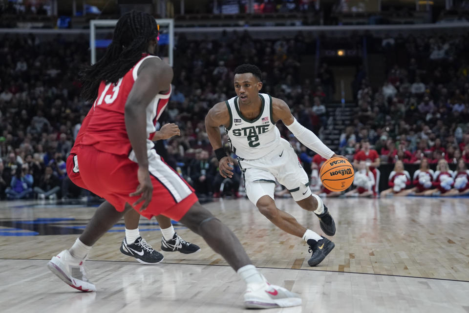 Michigan State's Tyson Walker (2) drives the ball during the second half of an NCAA college basketball game against Ohio State at the Big Ten men's tournament, Friday, March 10, 2023, in Chicago. (AP Photo/Erin Hooley)