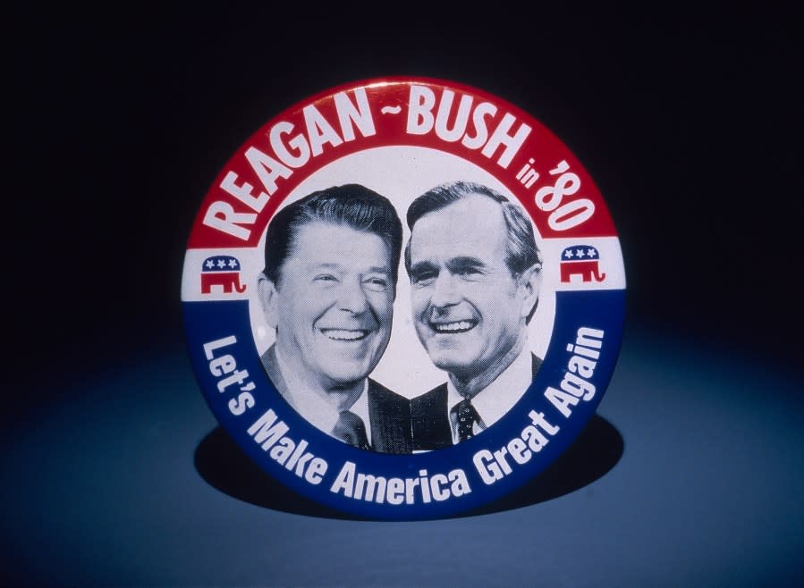 Badge for the 1980 Presidential Election, featuring Ronald Reagan and George Bush, with the words ‘Reagan-Bush in ’80, Let’s Make America Great Again.’ USA, 1980. (Photo by Fotosearch/Getty Images).