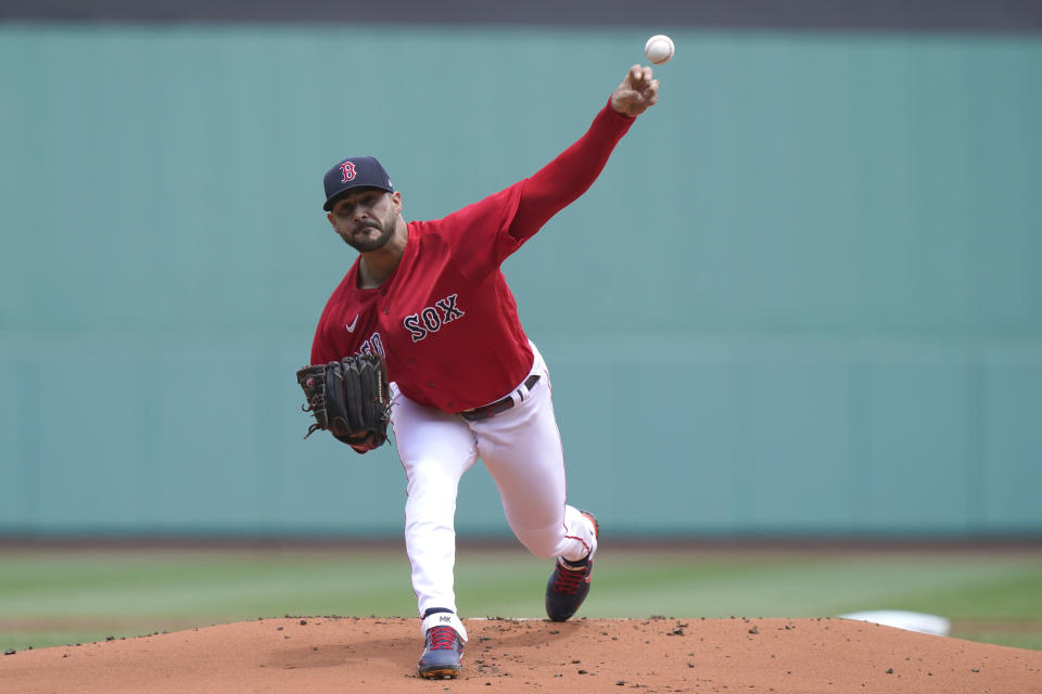 Boston Red Sox's Martin Perez delivers a pitch against the Toronto Blue Jays in the first inning of a baseball game, Sunday, June 13, 2021, in Boston. (AP Photo/Steven Senne)