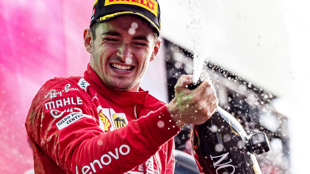 Charles Leclerc is pictured celebrating after winning the 2019 Italian GP for Ferrari.