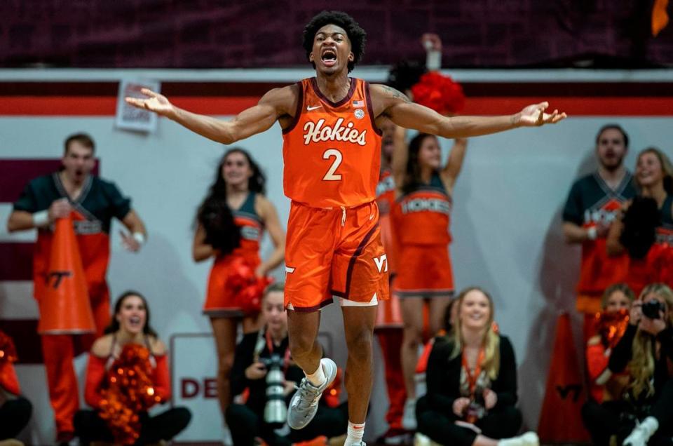 Virginia Tech’s M.J. Collins (2) reacts after sinking a three-point basket to give the Hokies a 35-23 lead in the first half on Sunday, December 4, 2022 at Cassell Coliseum in Blacksburg, Va.