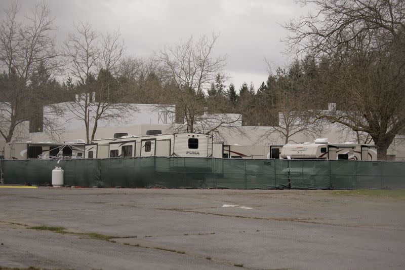 Recreational vehicles (RVs) are seen parked in an earmarked quarantine site for healthy people potentially exposed to novel coronavirus, behind Washington State Public Health Laboratories in Shoreline, north of Seattle