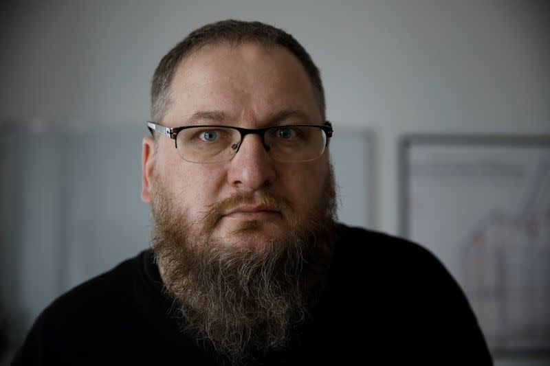 Director of Auschwitz-Birkenau State Museum Cywinski poses after an interview with Reuters in Warsaw