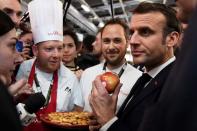 French President Macron on a marathon visit to France's giant agriculture fair