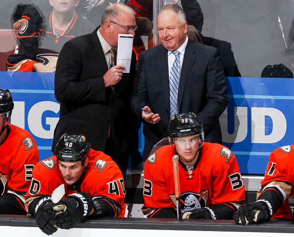 ANAHEIM, CA - NOVEMBER 20: Assistant coach Paul MacLean talks with head coach Randy Carlyle of the Anaheim Ducks during the game against the Los Angeles Kings at Honda Center on November 20, 2016 in Anaheim, California. (Photo by Debora Robinson/NHLI via Getty Images) *** Local Caption ***