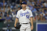 Kansas City Royals pitcher Kris Bubic reacts after walking Seattle Mariners' J.P. Crawford during the fourth inning of a baseball game in Kansas City, Mo., Saturday, Sept. 24, 2022. (AP Photo/Colin E. Braley)