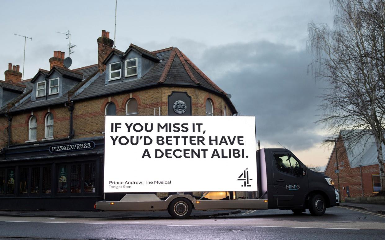 The mobile billboard promoting Prince Andrew: The Musical outside Pizza Express - Channel 4/PA