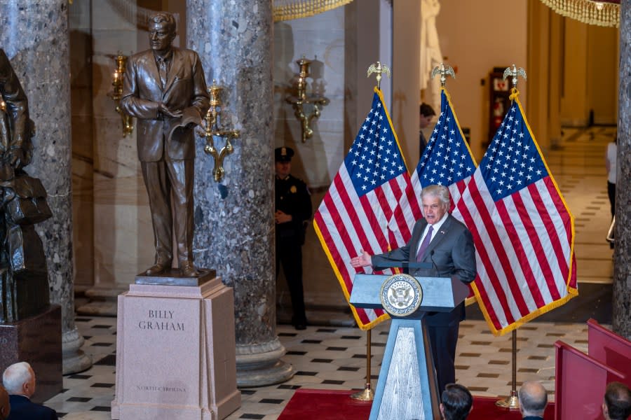 Rev. Franklin Graham, son of the late Rev. Billy Graham, speaks after unveiling a bronzed sculpture of his father at the U.S. Capitol in Washington, where it will stand on behalf of his native North Carolina, Thursday, May 16, 2024. Known as America’s pastor, Graham died in 2018 at age 99. (AP Photo/J. Scott Applewhite)