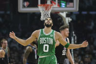 Boston Celtics forward Jayson Tatum (0) reacts after a foul call during the first half of an NBA basketball game against the Los Angeles Clippers in Los Angeles, Wednesday, Dec. 8, 2021. (AP Photo/Ashley Landis)