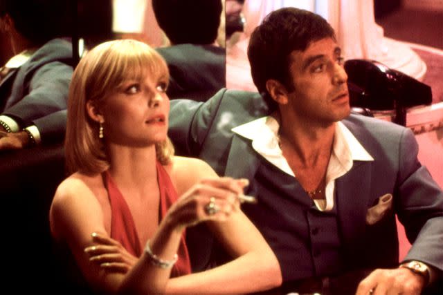 <p>Everett Collection</p> Michelle Pfeiffer and Al Pacino in 'Scarface'