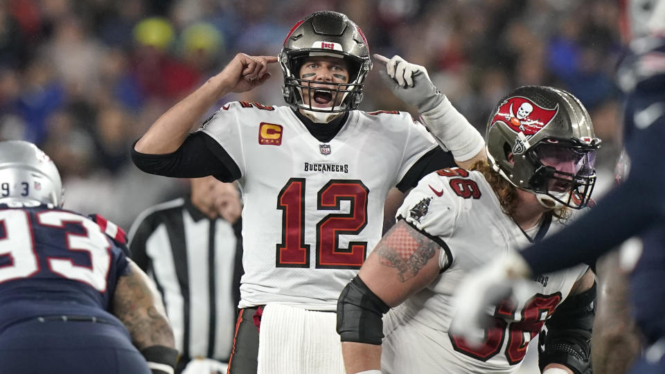 Tampa Bay Buccaneers quarterback Tom Brady (12) calls out a play at the line of scrimmage during the second half of an NFL football game against the New England Patriots, Sunday, Oct. 3, 2021, in Foxborough, Mass. (AP Photo/Steven Senne)